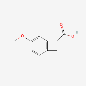 molecular formula C10H10O3 B13116062 Bicyclo[4.2.0]octa-1,3,5-triene-7-carboxylic acid, 4-methoxy- 