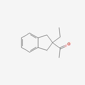 molecular formula C13H16O B1311659 1-(2-Ethyl-2,3-dihydro-1H-inden-2-yl)ethanone CAS No. 161695-23-4
