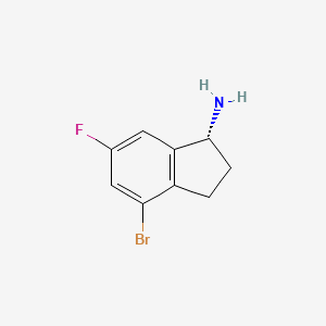 molecular formula C9H9BrFN B13131179 1H-Inden-1-amine,4-bromo-6-fluoro-2,3-dihydro-,(1R)- 