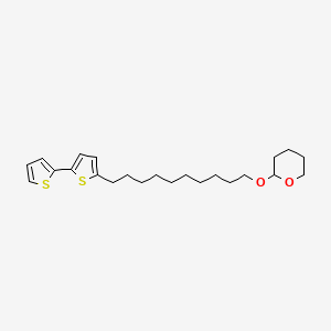 molecular formula C23H34O2S2 B13131406 2-{[10-([2,2'-Bithiophen]-5-yl)decyl]oxy}oxane CAS No. 821782-06-3