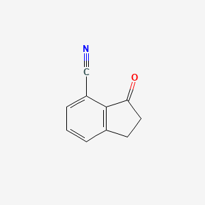 molecular formula C10H7NO B1313244 2,3-Dihydro-3-oxo-1H-indene-4-carbonitrile CAS No. 215362-26-8