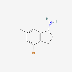 molecular formula C10H12BrN B13133492 1H-Inden-1-amine,4-bromo-2,3-dihydro-6-methyl-,(1R)- 