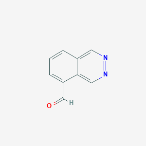 molecular formula C9H6N2O B13138226 Phthalazine-5-carbaldehyde 