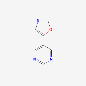 molecular formula C7H5N3O B13144509 5-(Pyrimidin-5-yl)oxazole 