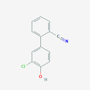 molecular formula C13H8ClNO B13149194 2-(3-Chloro-4-hydroxyphenyl)benzonitrile 