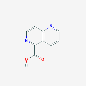molecular formula C9H6N2O2 B1315083 1,6-Naphthyridine-5-carboxylic acid CAS No. 74048-24-1
