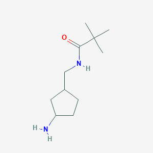 molecular formula C11H22N2O B13155655 N-[(3-aminocyclopentyl)methyl]-2,2-dimethylpropanamide 
