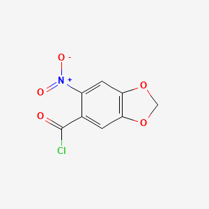 molecular formula C8H4ClNO5 B1317039 5-(Chloro)carbonyl-6-nitro-1,3-benzodioxole CAS No. 50425-29-1