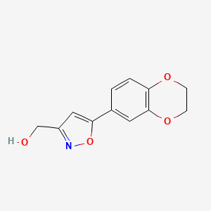 molecular formula C12H11NO4 B1317379 (5-(2,3-Dihydro-1,4-benzodioxin-6-YL)-3-isoxazolyl)methanol CAS No. 763109-37-1