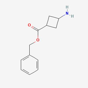 molecular formula C12H15NO2 B13177431 Benzyl (1r,3r)-3-aminocyclobutane-1-carboxylate 