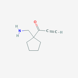 molecular formula C9H13NO B13178216 1-[1-(Aminomethyl)cyclopentyl]prop-2-yn-1-one 