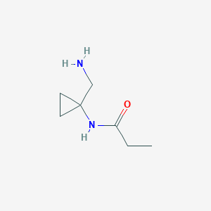 molecular formula C7H14N2O B13181277 N-[1-(Aminomethyl)cyclopropyl]propanamide 