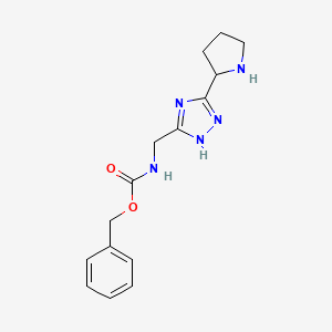 molecular formula C15H19N5O2 B13189625 Benzyl N-{[3-(pyrrolidin-2-yl)-1H-1,2,4-triazol-5-yl]methyl}carbamate 