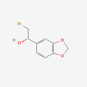 molecular formula C9H9BrO3 B13193484 (1S)-1-(2H-1,3-benzodioxol-5-yl)-2-bromoethan-1-ol 