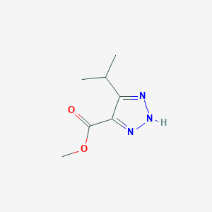 molecular formula C7H11N3O2 B13202373 Methyl 5-(propan-2-yl)-1H-1,2,3-triazole-4-carboxylate 