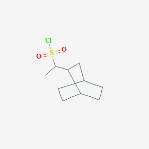 molecular formula C10H17ClO2S B13202465 1-{Bicyclo[2.2.2]octan-2-yl}ethane-1-sulfonyl chloride 