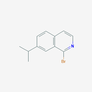 molecular formula C12H12BrN B13203799 1-Bromo-7-(propan-2-YL)isoquinoline 