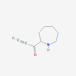 molecular formula C9H13NO B13204616 1-(Azepan-2-yl)prop-2-yn-1-one 
