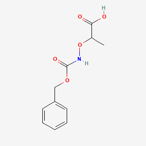 molecular formula C11H13NO5 B13206005 2-({[(Benzyloxy)carbonyl]amino}oxy)propanoic acid 