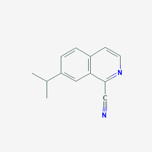 molecular formula C13H12N2 B13207789 7-(Propan-2-YL)isoquinoline-1-carbonitrile 