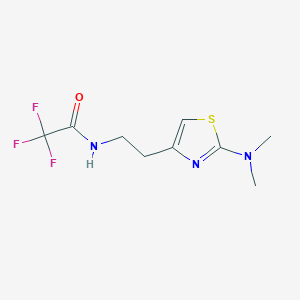 molecular formula C9H12F3N3OS B13208530 N-{2-[2-(dimethylamino)-1,3-thiazol-4-yl]ethyl}-2,2,2-trifluoroacetamide 