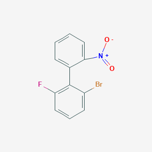 molecular formula C12H7BrFNO2 B13210242 1-Bromo-3-fluoro-2-(2-nitrophenyl)benzene 