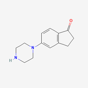 molecular formula C13H16N2O B1321084 5-(Piperazin-1-yl)-2,3-dihydro-1H-inden-1-one CAS No. 868245-03-8