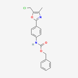 molecular formula C19H17ClN2O3 B13211853 Benzyl N-{4-[5-(chloromethyl)-4-methyl-1,3-oxazol-2-yl]phenyl}carbamate 
