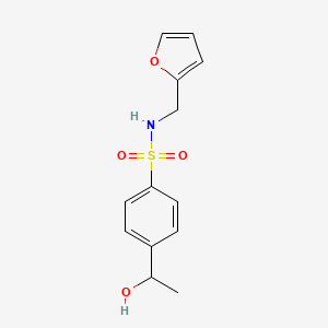 molecular formula C13H15NO4S B13215810 N-[(Furan-2-yl)methyl]-4-(1-hydroxyethyl)benzene-1-sulfonamide 
