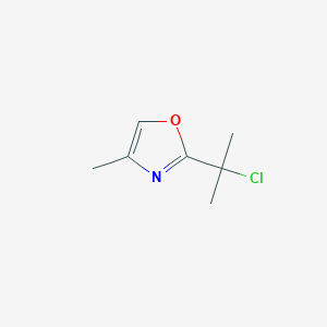 molecular formula C7H10ClNO B13222904 2-(2-Chloropropan-2-yl)-4-methyl-1,3-oxazole 