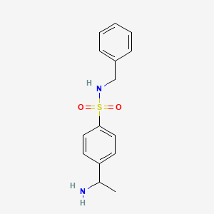 molecular formula C15H18N2O2S B13228328 4-(1-aminoethyl)-N-benzylbenzene-1-sulfonamide 