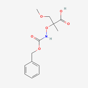 molecular formula C13H17NO6 B13228879 2-({[(Benzyloxy)carbonyl]amino}oxy)-3-methoxy-2-methylpropanoic acid 