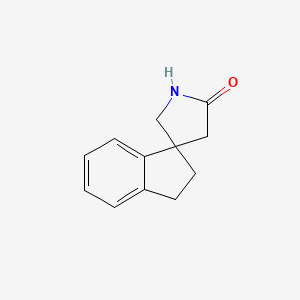 molecular formula C12H13NO B13232731 2,3-Dihydrospiro[indene-1,3'-pyrrolidine]-5'-one CAS No. 1472729-32-0