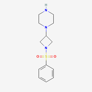 molecular formula C13H19N3O2S B13236691 1-[1-(Benzenesulfonyl)azetidin-3-yl]piperazine 