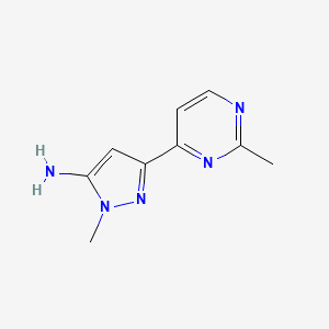 molecular formula C9H11N5 B13239221 1-Methyl-3-(2-methylpyrimidin-4-yl)-1H-pyrazol-5-amine 