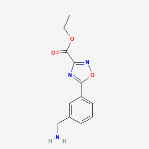 molecular formula C12H13N3O3 B13242885 Ethyl 5-[3-(aminomethyl)phenyl]-1,2,4-oxadiazole-3-carboxylate 