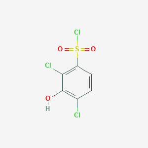 molecular formula C6H3Cl3O3S B13242956 2,4-Dichloro-3-hydroxybenzene-1-sulfonyl chloride 