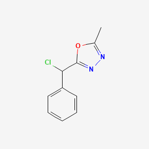 molecular formula C10H9ClN2O B13243491 2-[Chloro(phenyl)methyl]-5-methyl-1,3,4-oxadiazole 