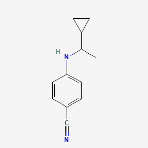 molecular formula C12H14N2 B13244813 4-[(1-Cyclopropylethyl)amino]benzonitrile 