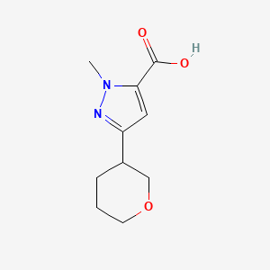molecular formula C10H14N2O3 B13246842 1-Methyl-3-(oxan-3-yl)-1H-pyrazole-5-carboxylic acid 