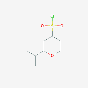 molecular formula C8H15ClO3S B13247886 2-(Propan-2-yl)oxane-4-sulfonyl chloride 