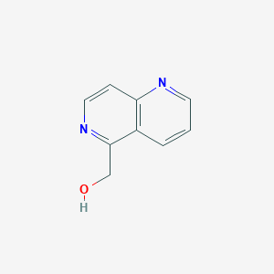 molecular formula C9H8N2O B13248080 1,6-Naphthyridin-5-ylmethanol 