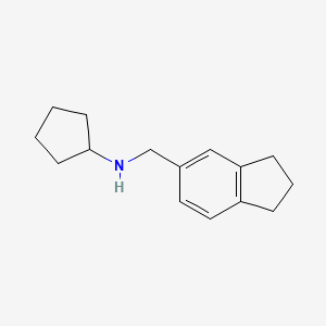molecular formula C15H21N B13248596 N-(indan-5-ylmethyl)cyclopentanamine 