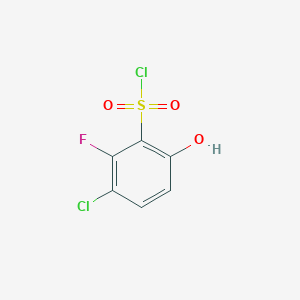 molecular formula C6H3Cl2FO3S B13254390 3-Chloro-2-fluoro-6-hydroxybenzene-1-sulfonyl chloride 