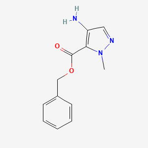 molecular formula C12H13N3O2 B13256534 Benzyl 4-amino-1-methyl-1H-pyrazole-5-carboxylate 