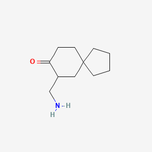 molecular formula C11H19NO B13259570 7-(Aminomethyl)spiro[4.5]decan-8-one 