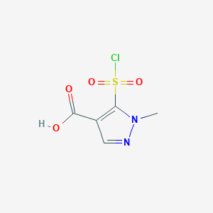 molecular formula C5H5ClN2O4S B13262086 5-(Chlorosulfonyl)-1-methyl-1H-pyrazole-4-carboxylic acid 