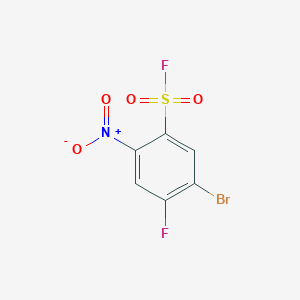 molecular formula C6H2BrF2NO4S B13262508 5-Bromo-4-fluoro-2-nitrobenzene-1-sulfonyl fluoride 