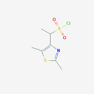 molecular formula C7H10ClNO2S2 B13262829 1-(2,5-Dimethyl-1,3-thiazol-4-YL)ethane-1-sulfonyl chloride 