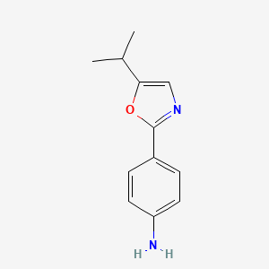 molecular formula C12H14N2O B13263025 4-[5-(Propan-2-yl)-1,3-oxazol-2-yl]aniline 